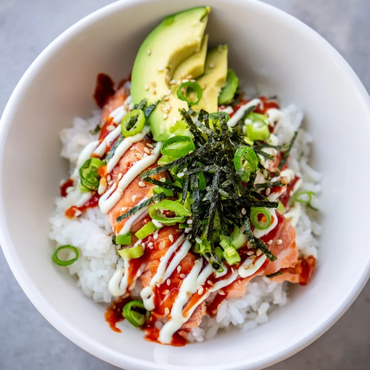 Flaked salmon and seasoned rice make up this comforting Classic Salmon Rice dish, ready to eat.