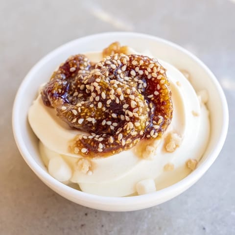 A beautiful Galaxy Spiral, berry jam spirals on yogurt with goat cheese "stars", ready to enjoy!